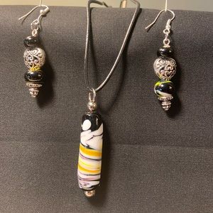 Uniquely designed and hand crafted Lamp work bead pendant and earring set